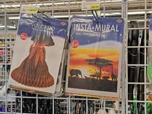 lot 2187 image: Safari Wall Decorations and Insta-Mural Volcano Tissue Centerpiece