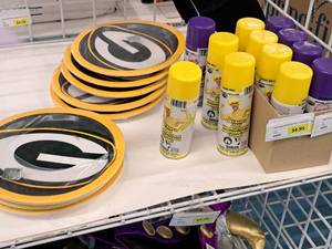 lot 2176 image: (8 Packs) 9 Green Bay Packers Plates and (12 Cans) Body Make-Up Spray