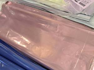lot 2153 image: (2) Packs of Pink Mylar 18x30 100-sheetspack