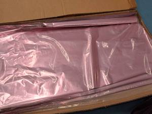lot 2157 image: (4) Packs of Pink Mylar 18x30 100-sheetspack