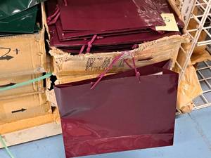 lot 2322 image: Lot of (100) Burgundy Gift Bags 16x4-34x12