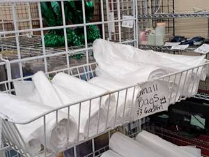 lot 2420 image: Rolls of 33-Gallon Plastic Bags - (7) Full, (4) Partial