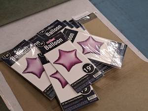lot 2557 image: Lot of (13) 19 Chrome Pink Star Balloons