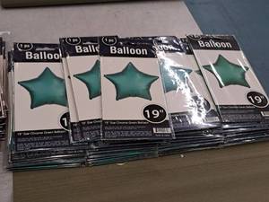 lot 2571 image: Lot of (13) 19 Chrome Green Star Balloons