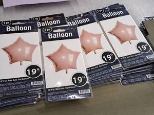 lot 2573 image: Lot of (12) 19 Foil Rose Gold Star Balloons