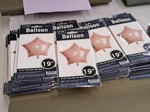 lot 2574 image: Lot of (12) 19 Foil Rose Gold Star Balloons