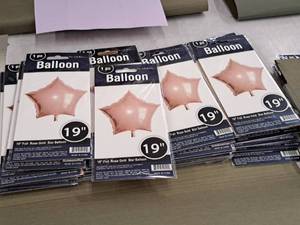 lot 2576 image: Lot of (12) 19 Foil Rose Gold Star Balloons