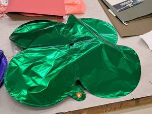 lot 2591 image: Lot of (61) Green Foil Balloon Quad Balloons 12x12