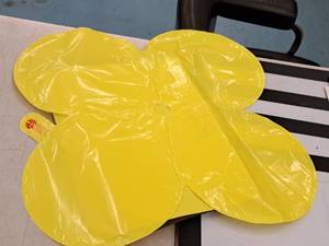 lot 2597 image: Lot of (19) Yellow Foil Balloon Quad Balloons 12x12