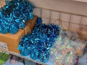 lot 2486 image: Lot of (86) Assorted Blue & Irridescent Foil Balloon Weights 2-14Dx5