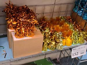 lot 2487 image: Lot of (80) Assorted Orange & Gold  Foil Balloon Weights 2-14Dx5