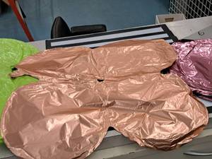 lot 2627 image: Lot of (50) Rose Gold Foil Balloon Quad Balloons 25x25
