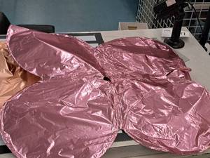lot 2628 image: Lot of (35) Pink Foil Balloon Quad Balloons 25x25