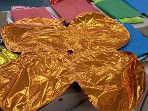 lot 2631 image: Lot of (25) Orange Foil Balloon Quad Balloons 30x30