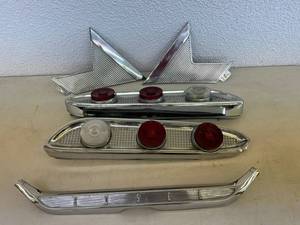 lot 43 image: Edsel Tail Lights & Emblem