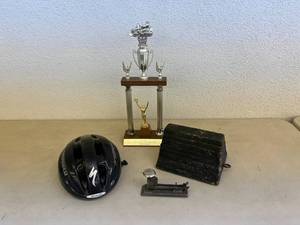 lot 58 image: Vintage Trophy, Stapler, Helmet & Tire Chock