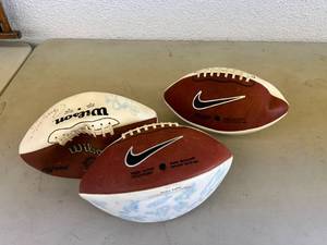 lot 103 image: Nike & Wilson Footballs