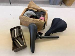 lot 121 image: Bicycle Seats, Pedals & Rollerblade Parts