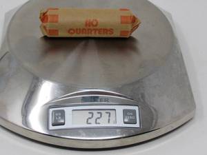 Mystery lot $10 roll of old  silver Quarters 227 gr