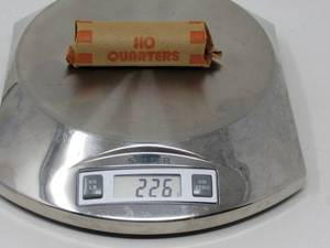 Mystery lot $10 roll of old  silver Quarters 226 gr
