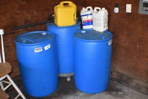 lot 13 image: Kerosene and Barrels and Cans