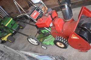 lot 26 image: Lawn Boy and Toro Snoblower