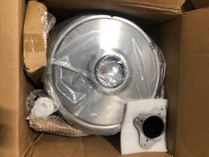lot 12 image: Hampton Bay 48000 BTU Stainless Steel Propane Standing Patio Heater with Wheels  Customer Returns See Pictures