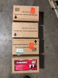 lot 39 image: Lot of Husky 5 in. Caster Kit for Ready-to-Assemble Steel Garage Base Cabinets   Customer Returns See Pictures