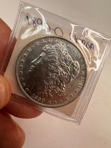 lot 45 image: 1890-O Morgan Dollar