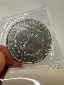 lot 21 image: 1887 Morgan Dollar