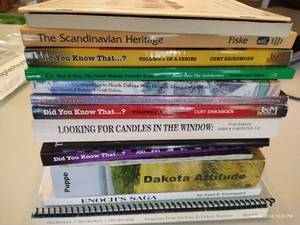 lot 8 image: Stack of Books - Mostly Dakotas Local Interest