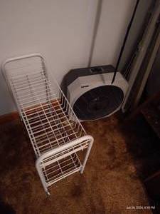 lot 69 image: Closet of Home Goods Organizers, Cords, Fan, Step Ladder, Curtain Rods