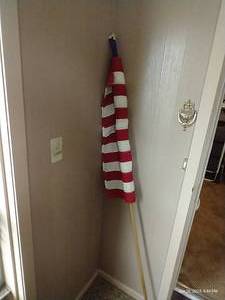 lot 87 image: Porch Cotton Flag