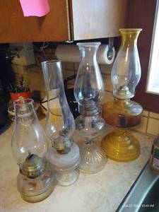 lot 94 image: Four Kerosene Lamps