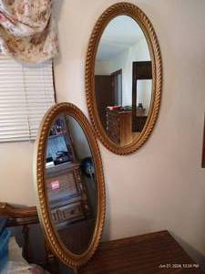 lot 102 image: Pair of Large Oval Mirrors