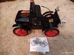 lot 113 image: 1904 Curved Dash Oldsmobile Decanter