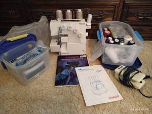 lot 146 image: Singer Thread Overlocker and Threads