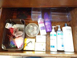 lot 187 image: Bottom Bathroom Drawer Contents - Soaps, Hair Care, Etc
