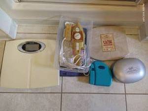 lot 191 image: Scale, Nail Dremel, Twist Exerciser, Sitting Walker & Steamer