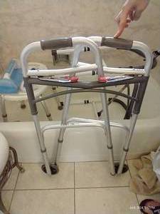 lot 194 image: Shower Helpers Chair, Handles, Walker, Cane, Stabilizer