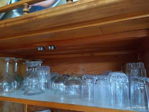 lot 229 image: Shelf of Stemware, Cups, Juice Glasses