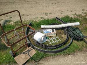 lot 361 image: Misc Yard Lot- Dolly, Leaf Bag, Flexible Downspout, Garden Edge