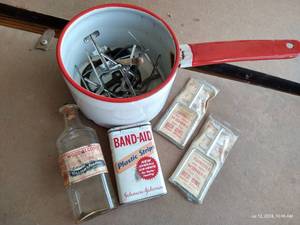 lot 521 image: Enamel Pot w Vintage Bottles, Tins, Etc