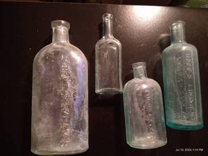 lot 573 image: Four Blue Bottles- Lydia E. PInkhams Veg. Compound Chap H Hetchers Gastoria Ponds Extract Etc