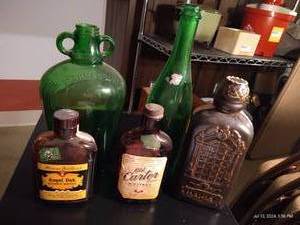 lot 579 image: Five Liquor Jars- 12 Gallon Green Jar