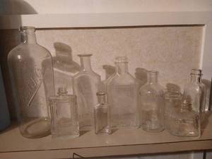 lot 591 image: Nine Antique Glass Medicine Bottles