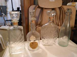 lot 614 image: Four Glass Decanters- Schenely, Cabin Still, etc