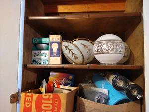 lot 630 image: Cabinet of Water Filters, Light Fixtures, Light Bulbs, Misc Hardware