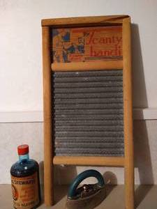 lot 633 image: Small Iron, Mrs. Stewarts Liquid Bluing & Small Washboard