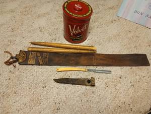 lot 709 image: Velvet Tin, Sharpening Strap, Manganese Knife